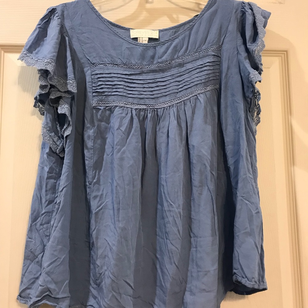 Blue blouse with fringe and lace